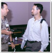 Dale's campaign manager, Mike Powers (right), listening to a citizen's concerns.