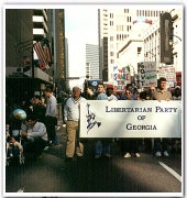 Dale (bottom left, kneeling by Dessie Mae) marching in the Martin Luther King Jr. Day Parade with the Libertarian Party of Georgia